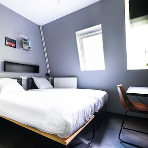 Kleine Kamer met Twee Aparte Bedden